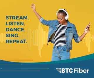 May be an image of 1 person and text that says 'STREAM. LISTEN. DANCE. SING REPEAT. BTC Fiber'